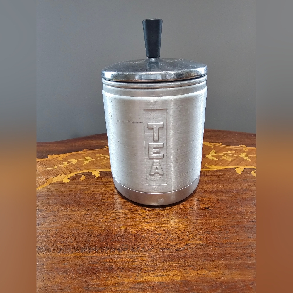 Vintage aluminum tea canister